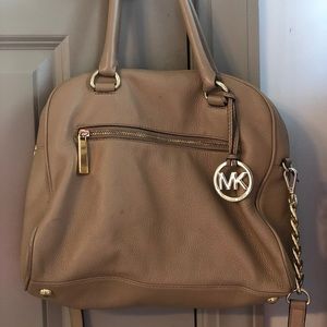 Tan medium sized Michael Kors Purse